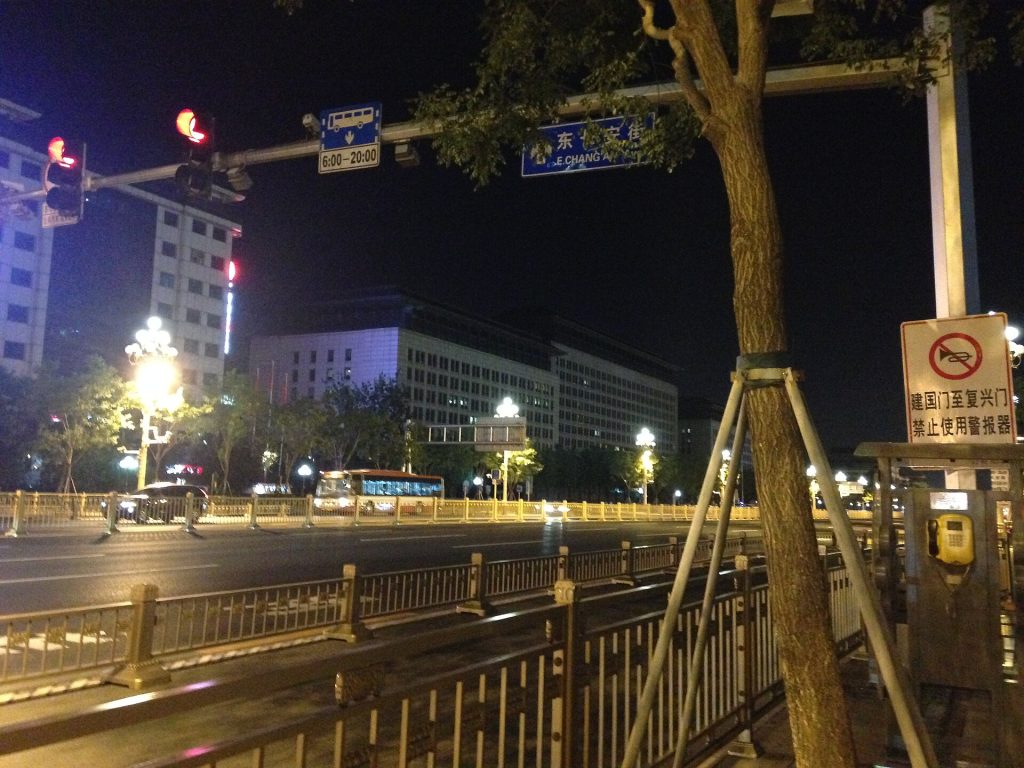 A Beijing street scene illuminated at night