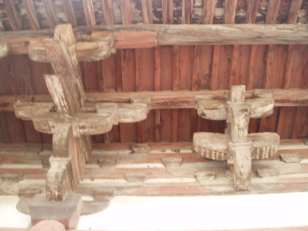 Close-up of timber brackets and joinery in a surviving Shanxi temple hall