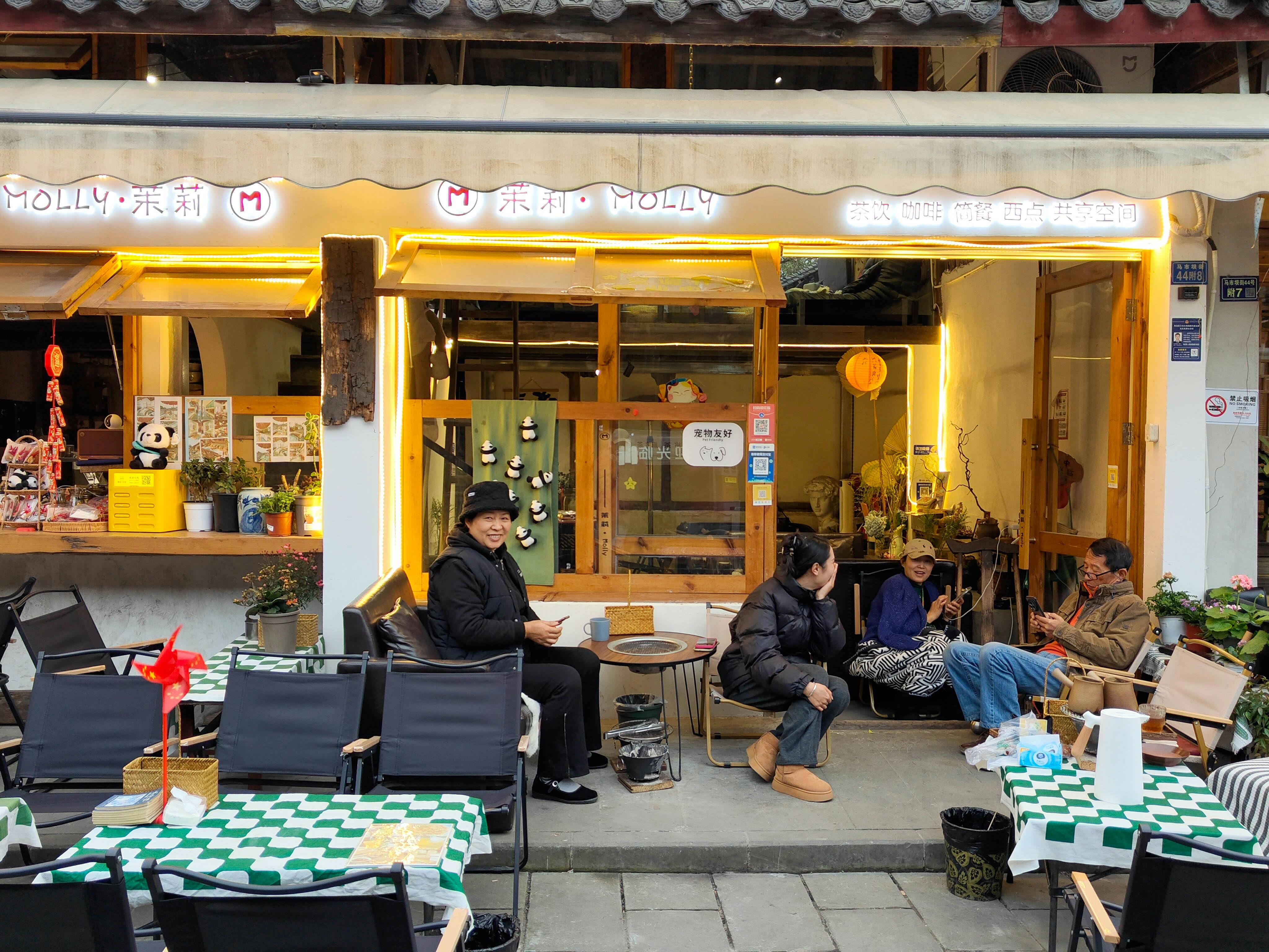People sitting outside a traditional Chengdu tea house