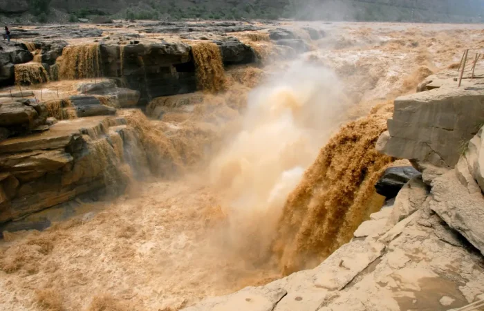 Hukou Waterfall sending up mist on the Yellow River